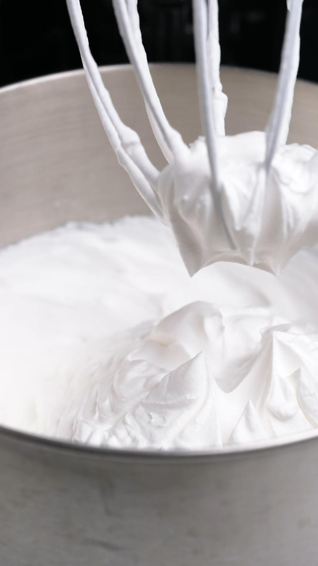 whipped cream that has been whipped to stiff peaks with a stand mixer.