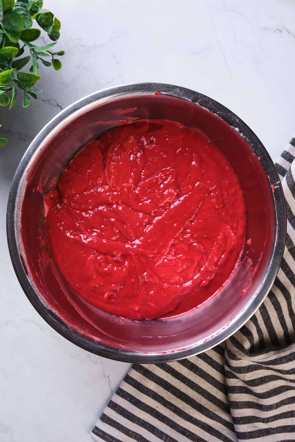 The prepared strawberry cake batter in a bowl.