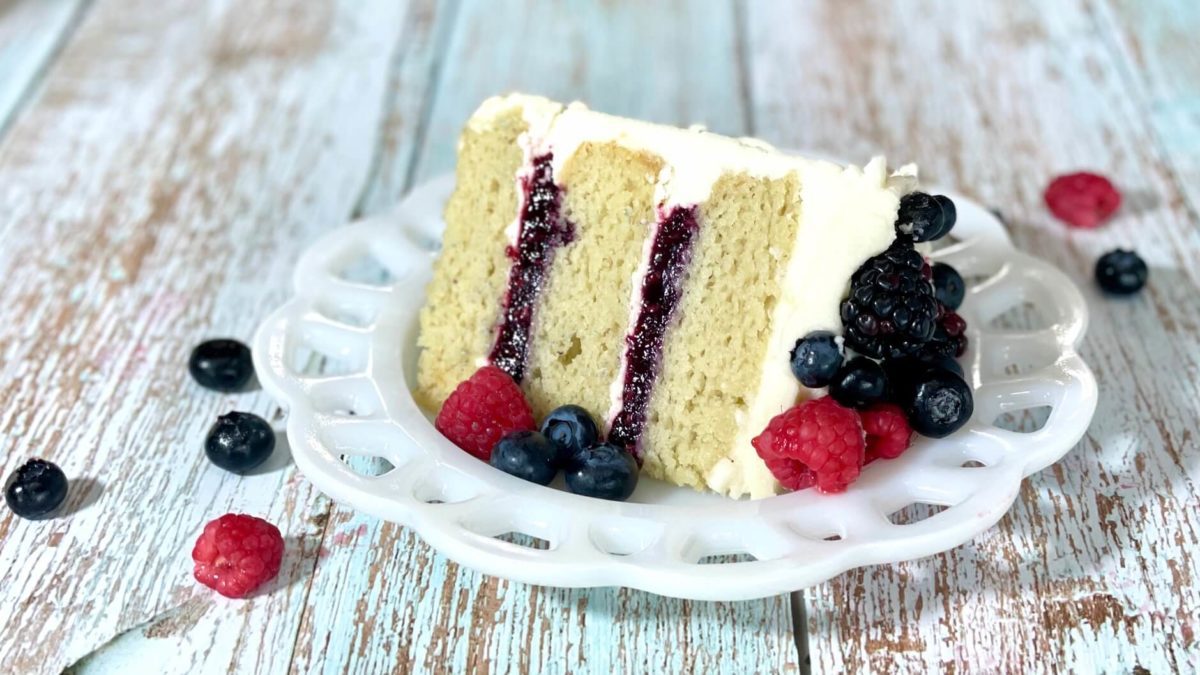Vanilla Almond cake with triple berry compote filling