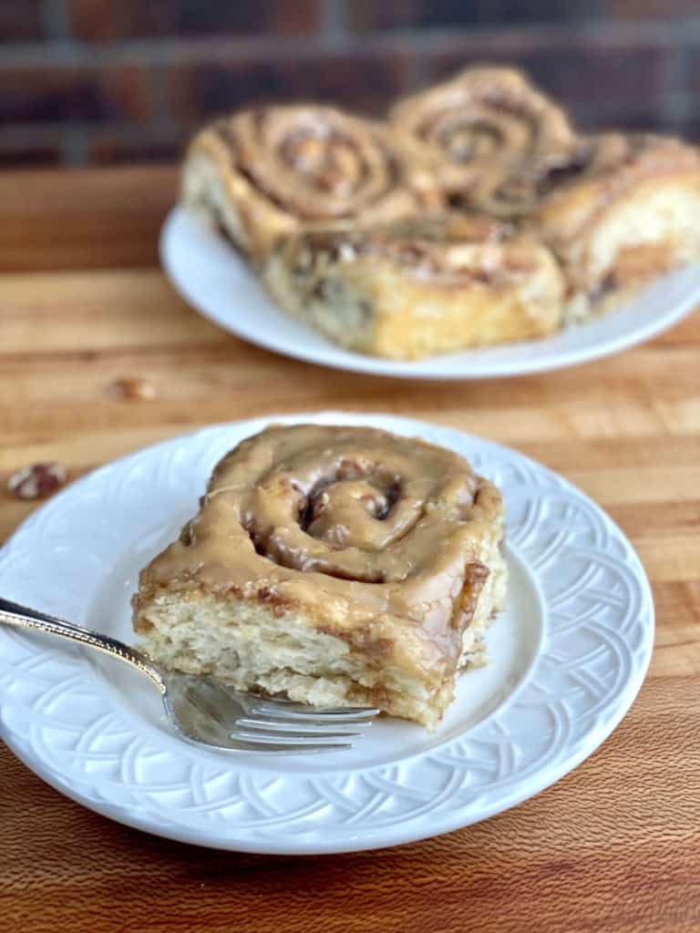 Bakery style maple pecan cinnamon rolls