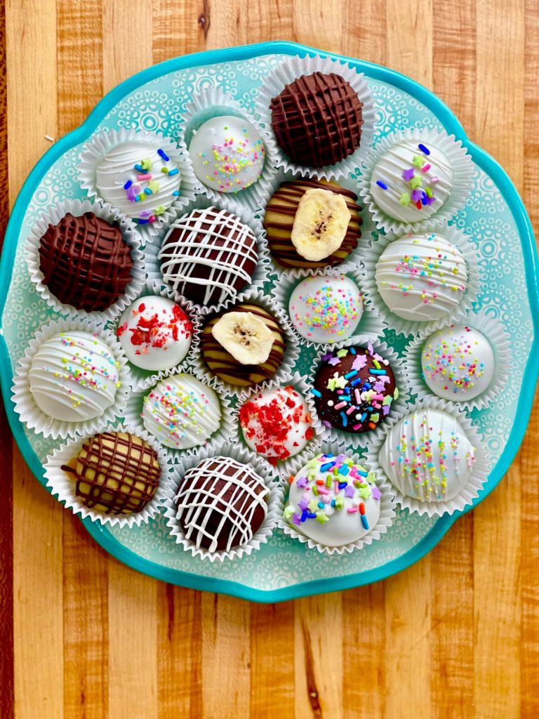 bakery-style cake truffles on a plate