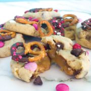 chocolate chip pretzel cookies with a gooey caramel center