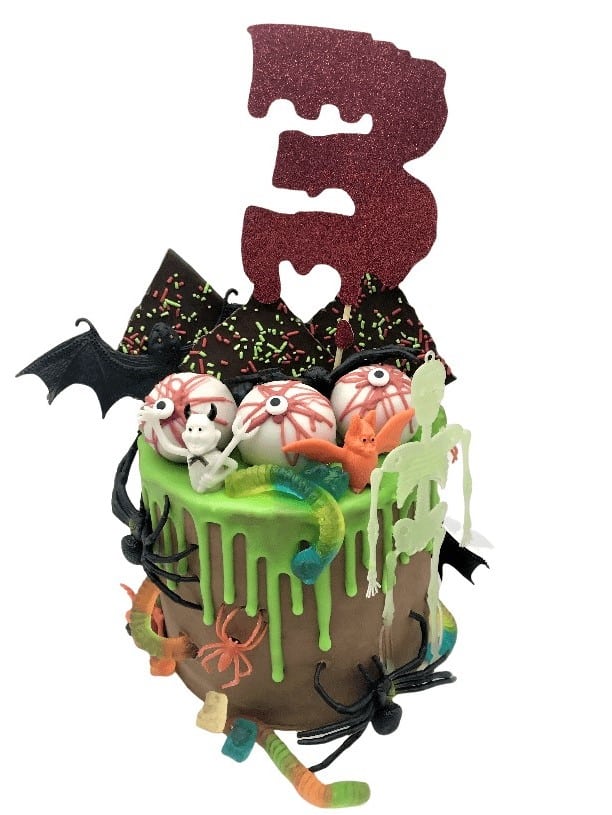 an image of a halloween themed drip cake