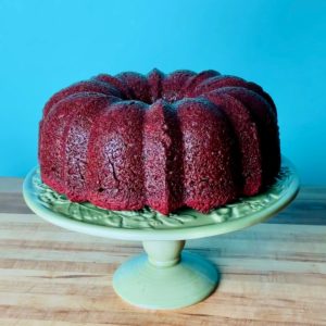 An unfrosted red velvet bundt cake