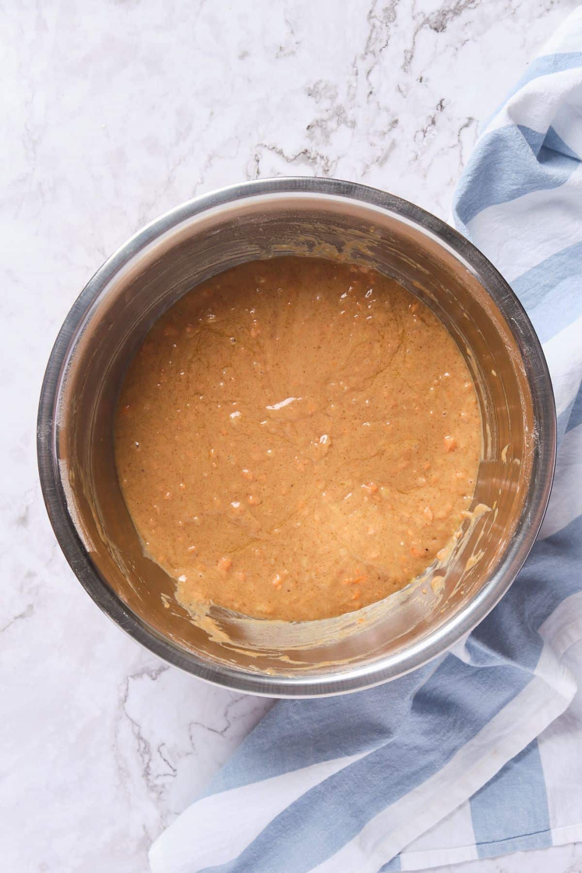 Carrot cake batter in a bowl.