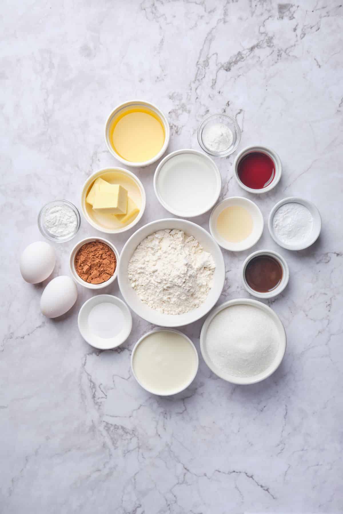 An overhead shot of red velvet cupcake recipe ingredients.