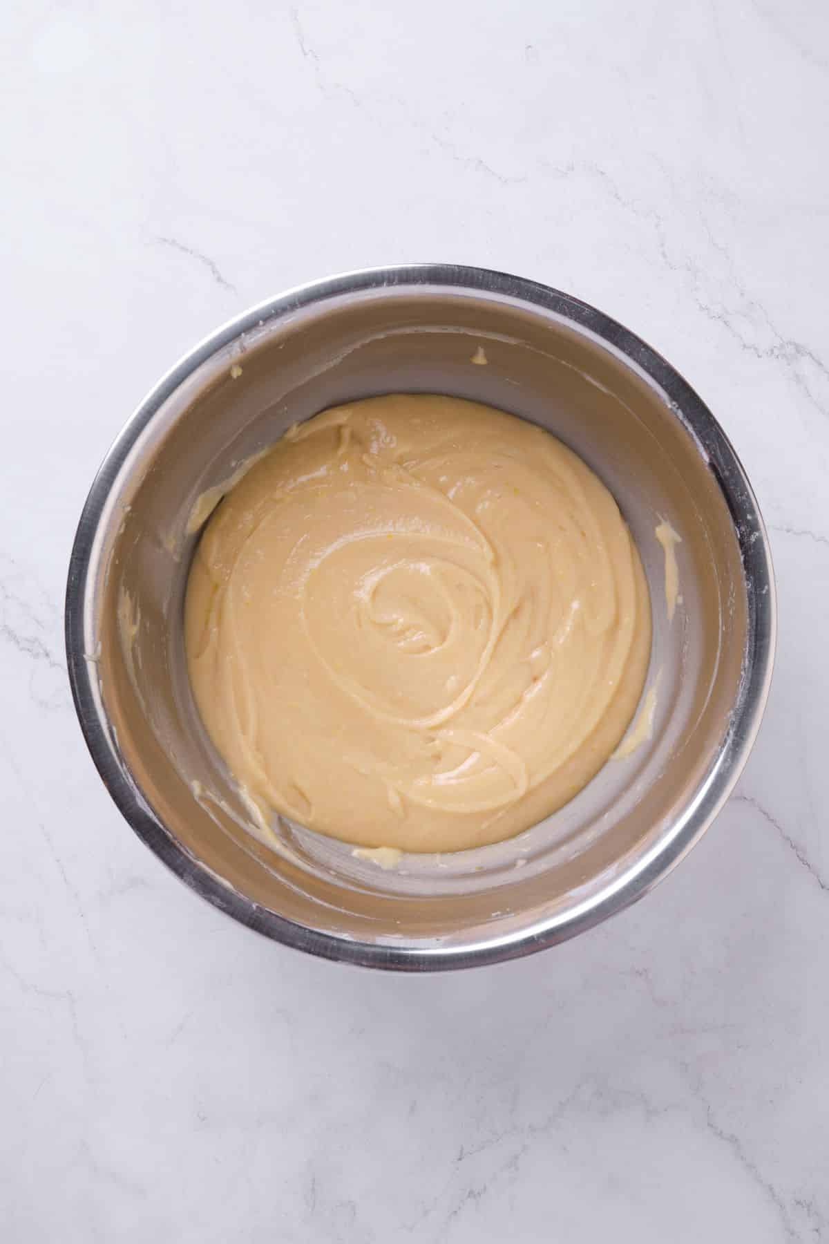 A bowl of lemon cake batter.