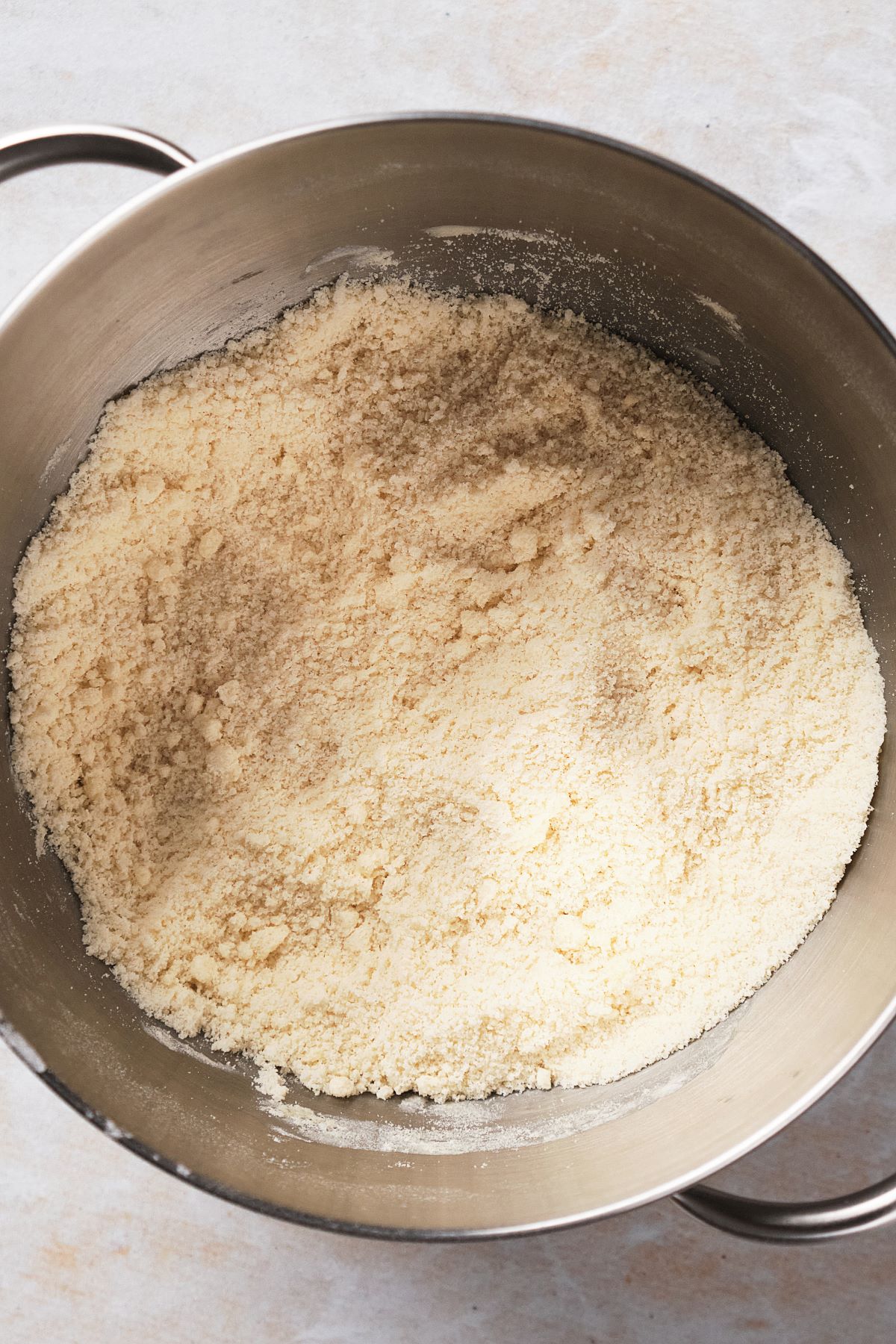 The sandy texture of the reverse creaming method when making the coocnut cake batter.