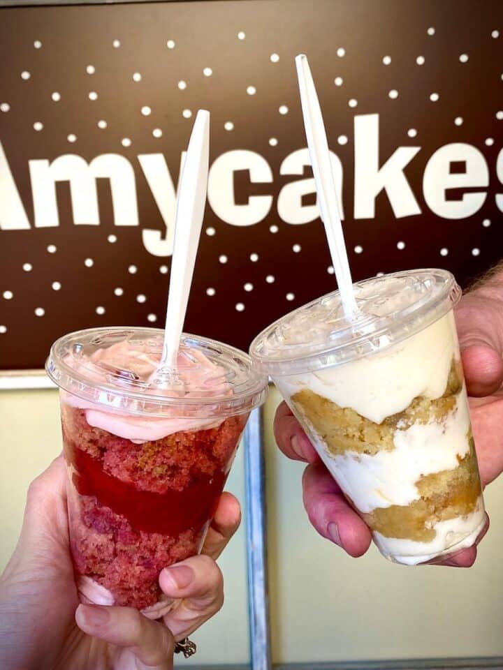 image of two cake cup parfaits in front of Amycakes banner.