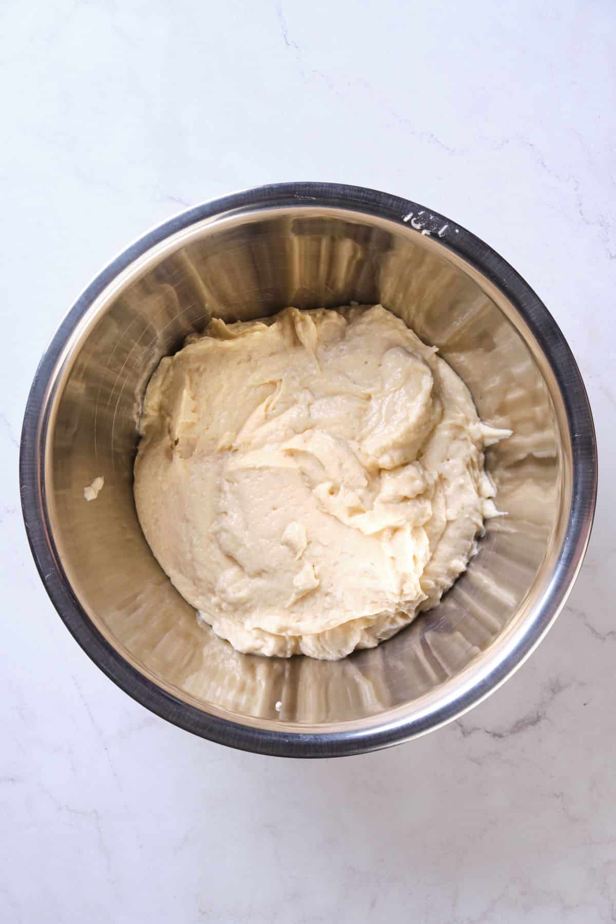 cake batter after adding the wet and dry ingredients for the traditional creaming method.