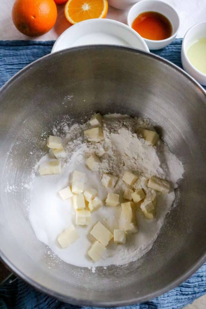 sifted dry ingredients and room temperature salted butter in a mixing bowl to make cupcake batter.