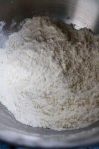 dry ingredients for cupcakes with the butter mixed in until the mixture looks sandy.